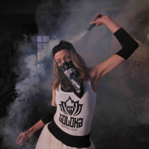 GOLOKA Burning Wear collection lookbook cover: model in a bandana face mask and GOLOKA Burning Wear tank top amid smoke