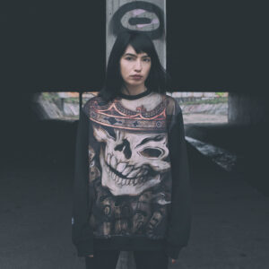 GOLOKA Street Kingz collection lookbook cover: model wearing a black skull and crown graphic sweatshirt under a bridge